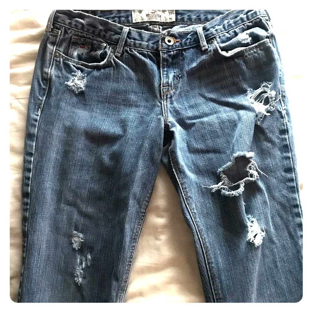 Hollister boot cut jeans with acid wash rips.